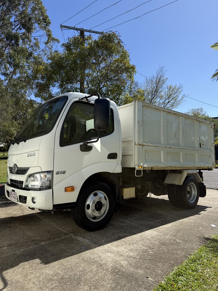 White Hino work truck after a fleet detail