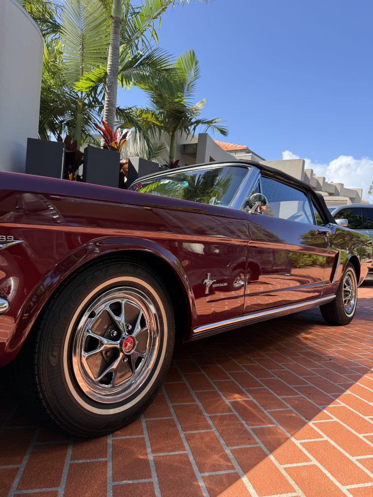 Classic red Ford Mustang convertible after a detail